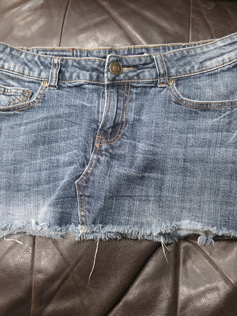 Vigoss Brown Leather Logo Patch on Blue Denim